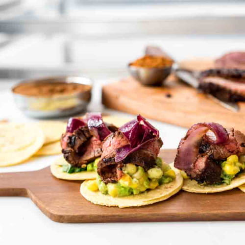 Flank Steak Tacos with Avocado Sweet Corn Guacamole and Grilled Cuban Onions - Recipe