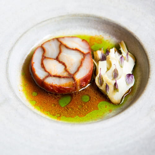 Paprika Marbled Halibut with Artichokes Eggplant Black Garlic and Tomato Broth with Samphire Oil - Recipe