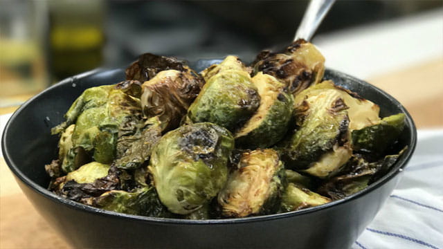 ROASTED BRUSSELS SPROUTS WITH HONEY SRIRACHA GLAZE