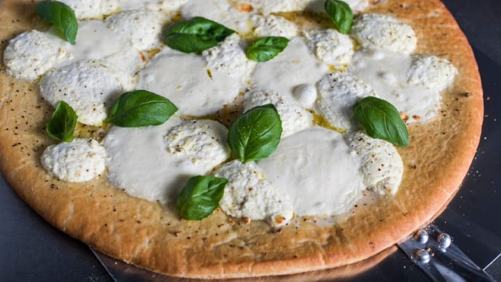 White Pizza with Mozzarella Basil and Lemon Pepper