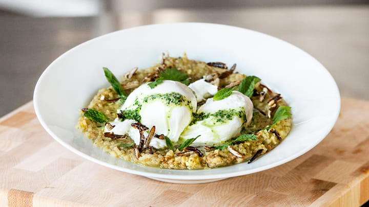 Thai Green Curry Congee with Thai Sausage Poached Eggs and Puffed Rice