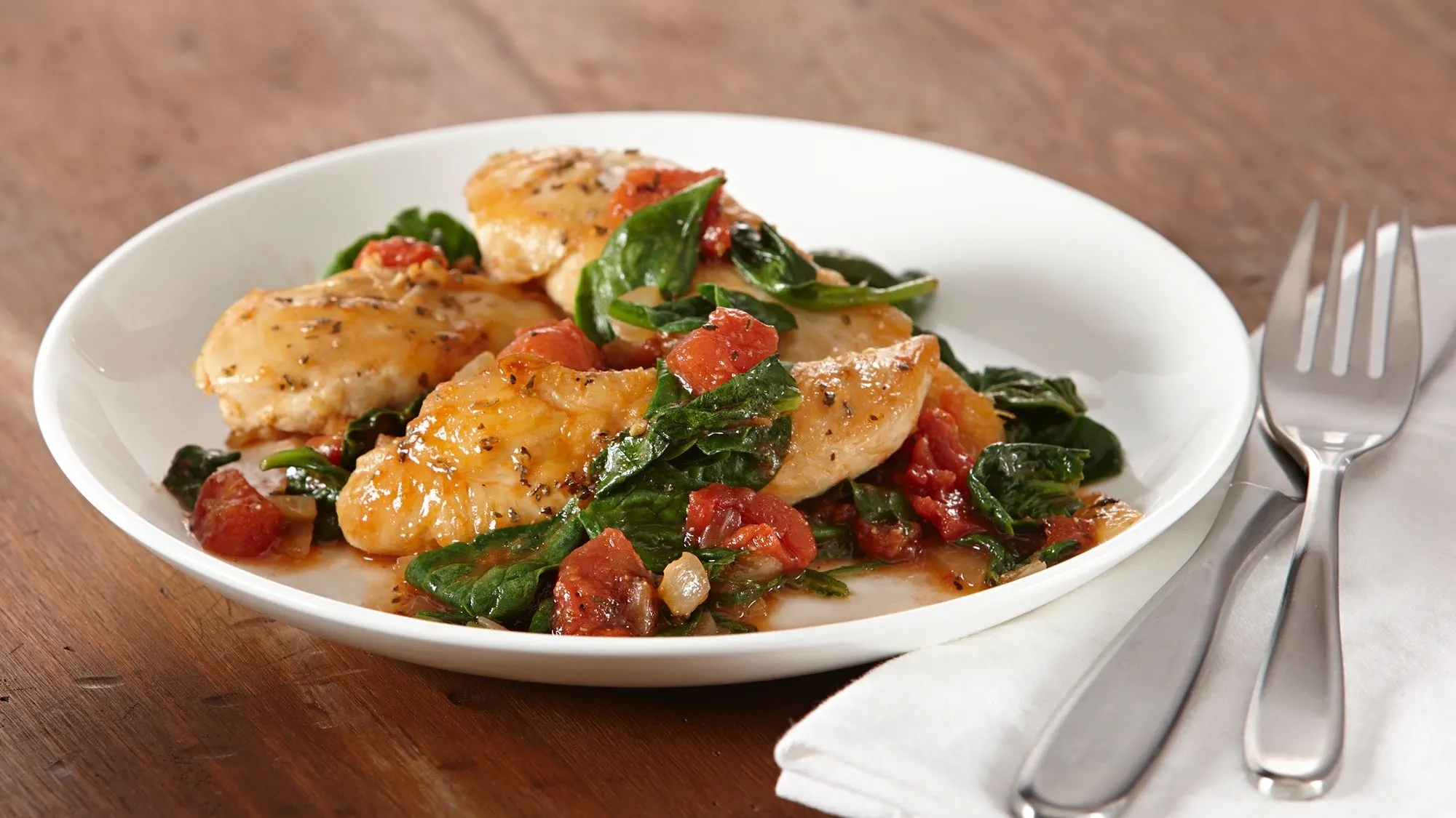 CHICKEN TENDERS WITH SPINACH AND TOMATOES