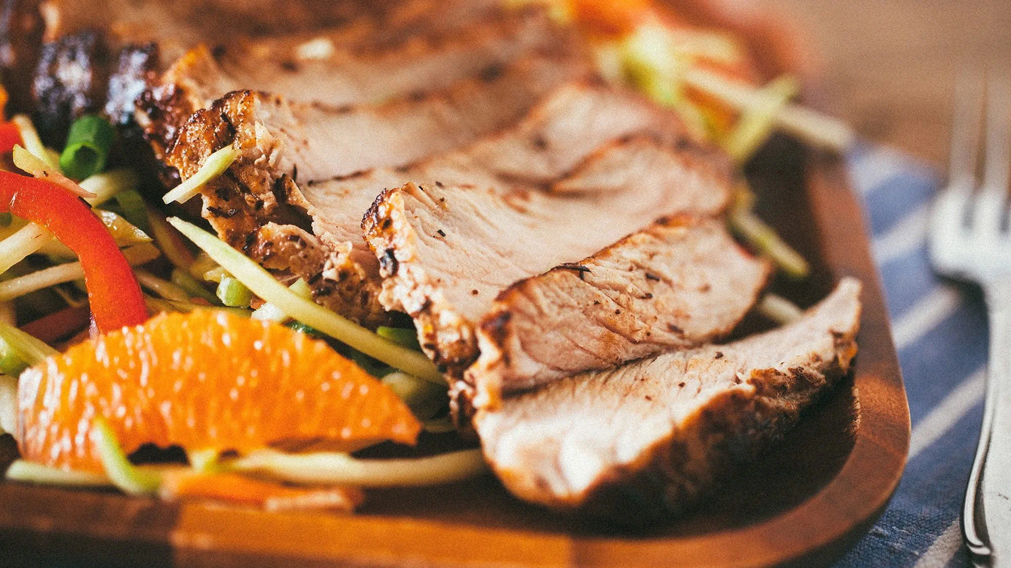 FIVE SPICE TEA-INFUSED PORK CHOPS WITH CITRUS SLAW FIVE SPICE TEA-INFUSED PORK CHOPS WITH CITRUS SLAW