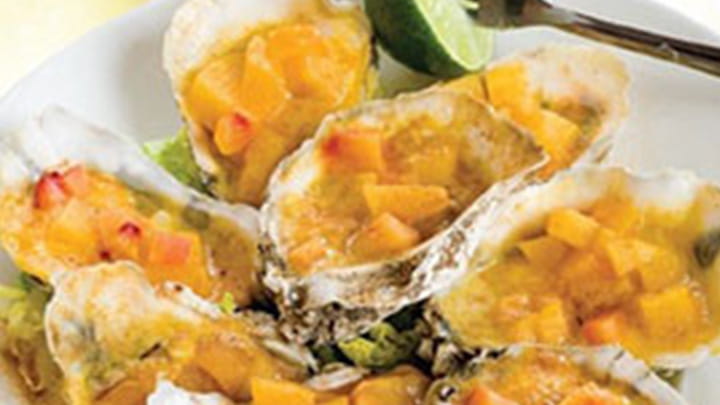 Grilled-Oysters-with-Peach-and-Old-Bay-Butter