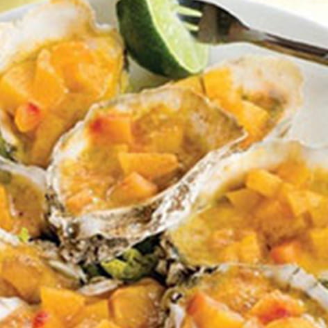 Grilled-Oysters-with-Peach-and-Old-Bay-Butter