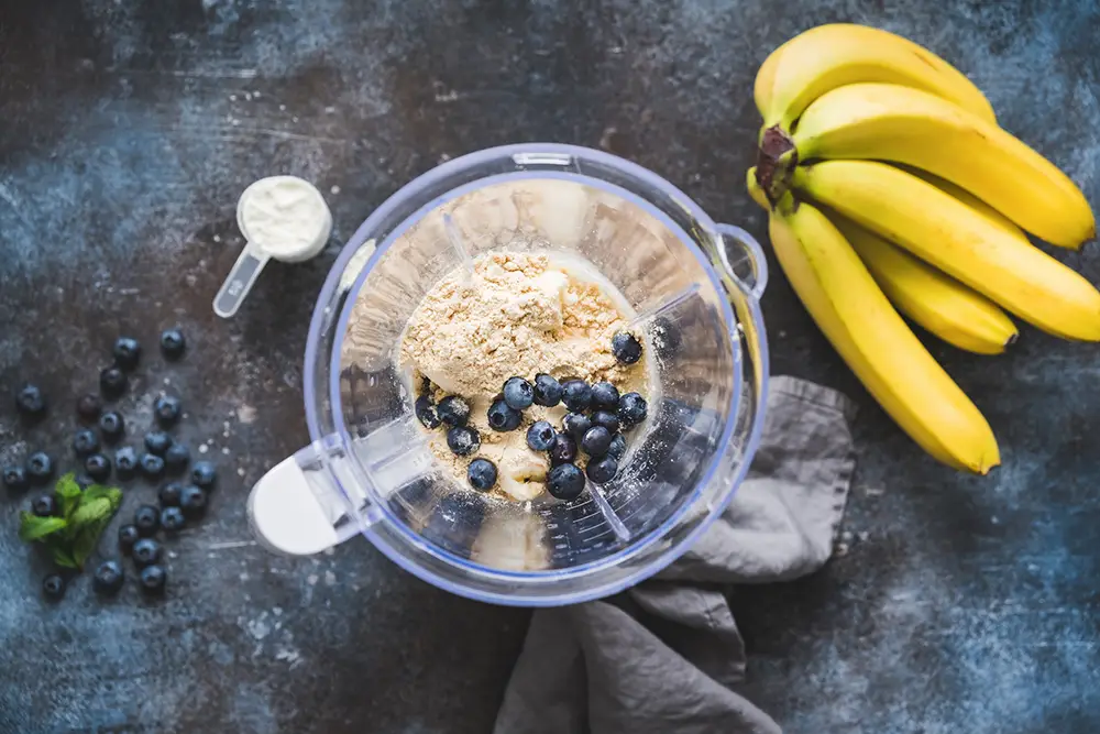 Blender-with-whey-protein-blueberries-and-banannas-shake