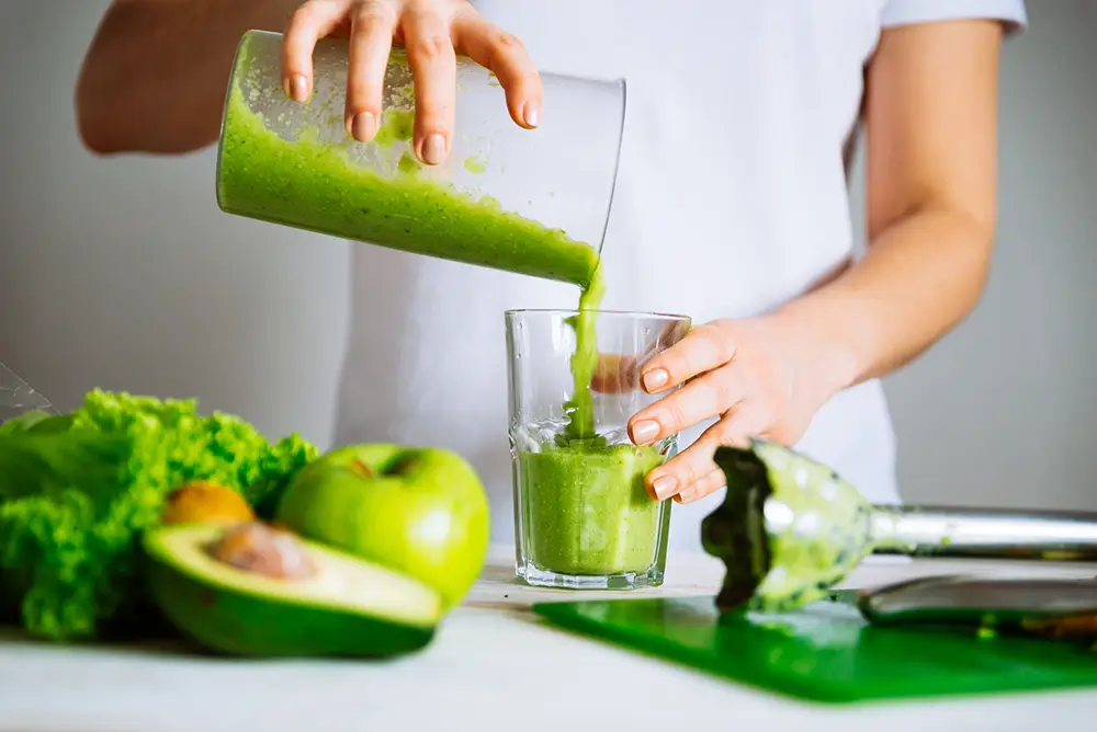 Green-smoothie-with-apples-avocado-kale-healthy-wellness
